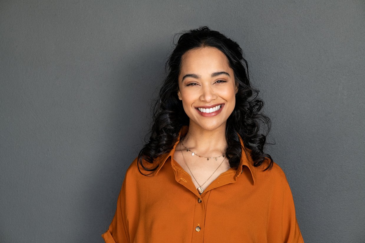 Portrait of Happy Young Hispanic Woman Smiling